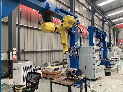 Automated robotic assembly line for laser cleaning machine manufacturing